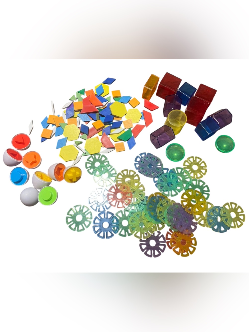 Early Stem learning shape manipulatives, brain flakes, 3D shapes, egg shape sort